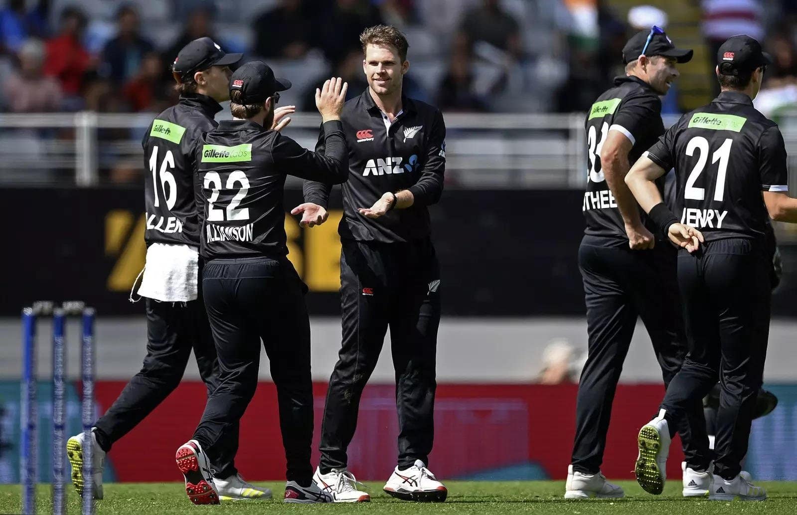 new-zealand-bowler-lockie-ferguson-center-celebrates-with-teammates-after-the-